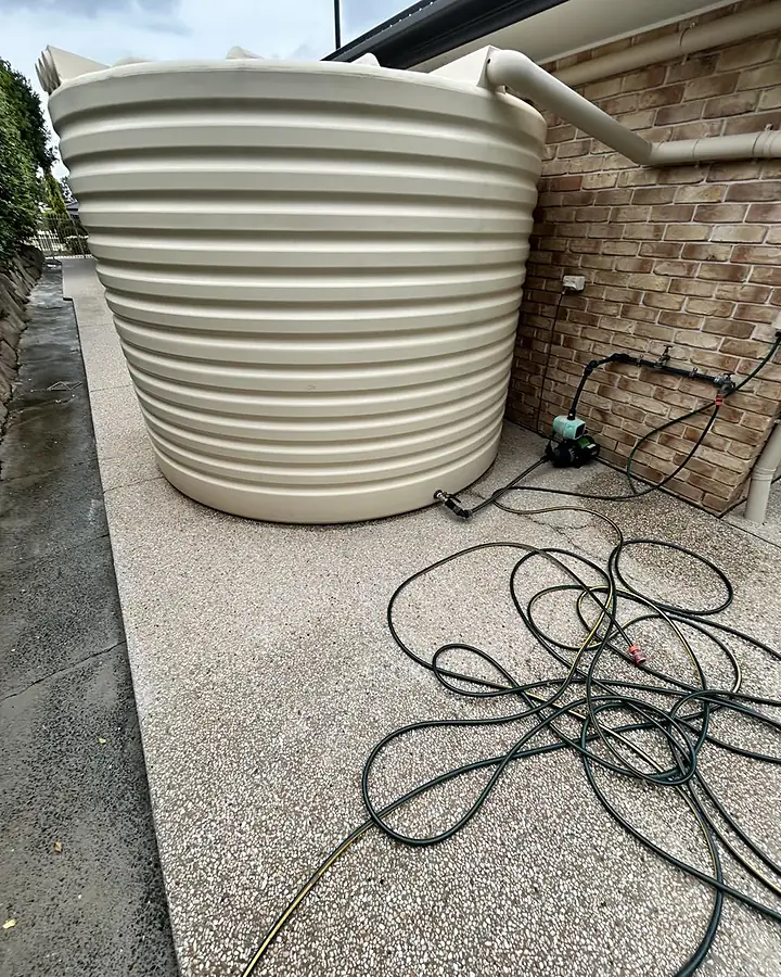The same aggregate path clean beside the tank