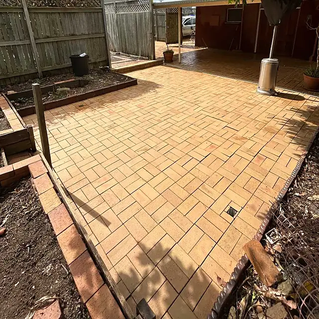 The same brick paving restored after pressure cleaning