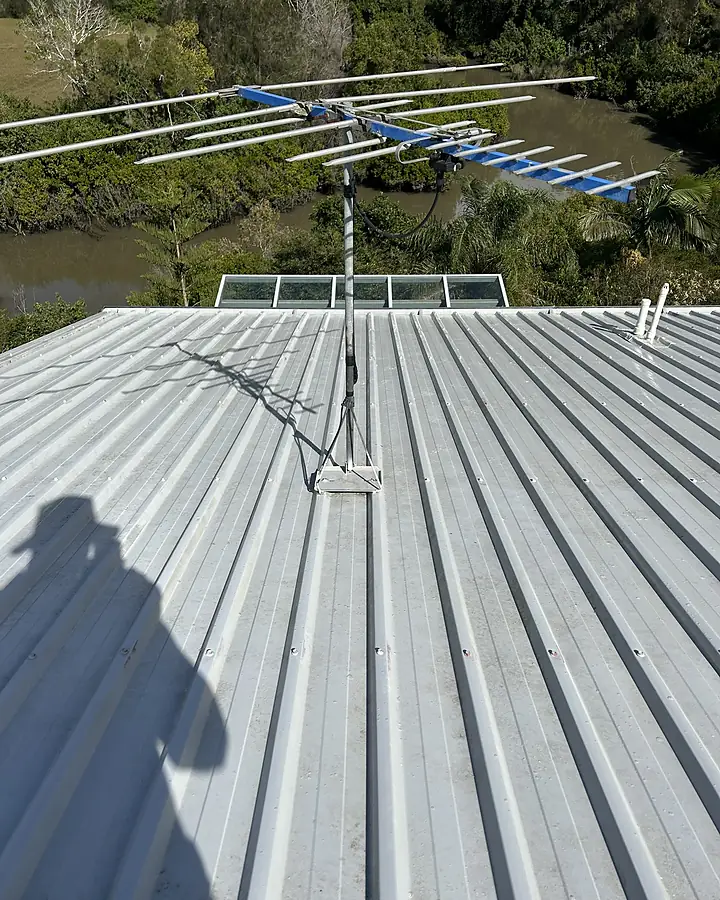The same Corinda roof after a full clean, an even pale grey