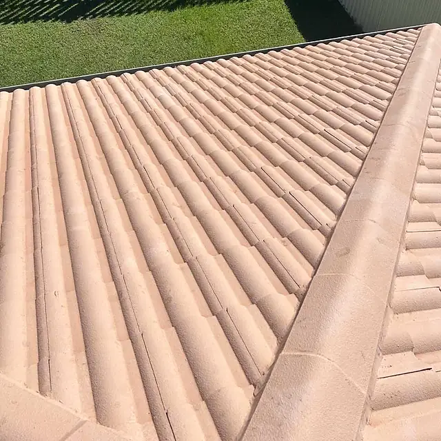 The same concrete tile roof after a Posh Wash roof clean