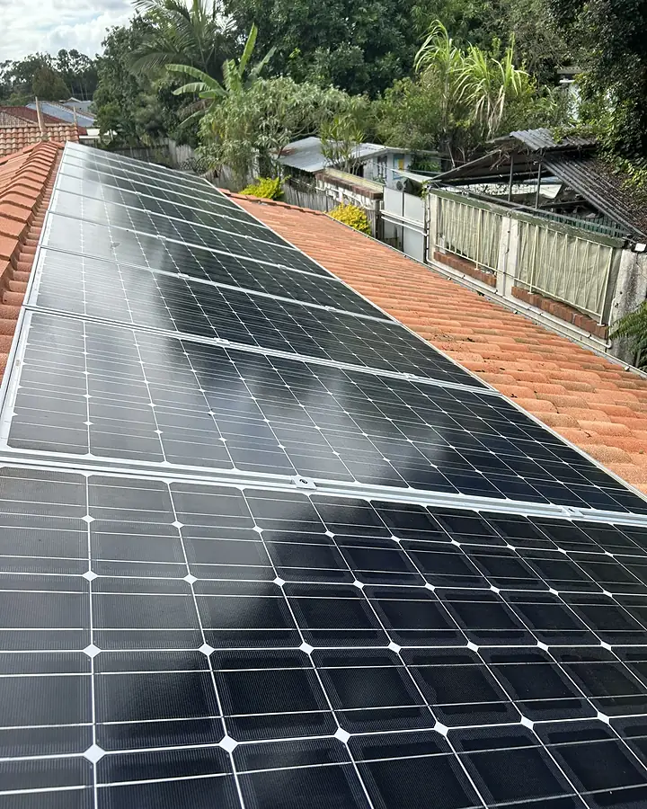 The same solar panels clean and reflective after deionised water cleaning
